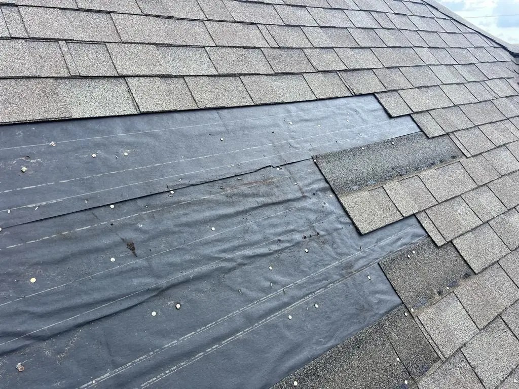 Missing shingles from Wind damage in Houston Texas