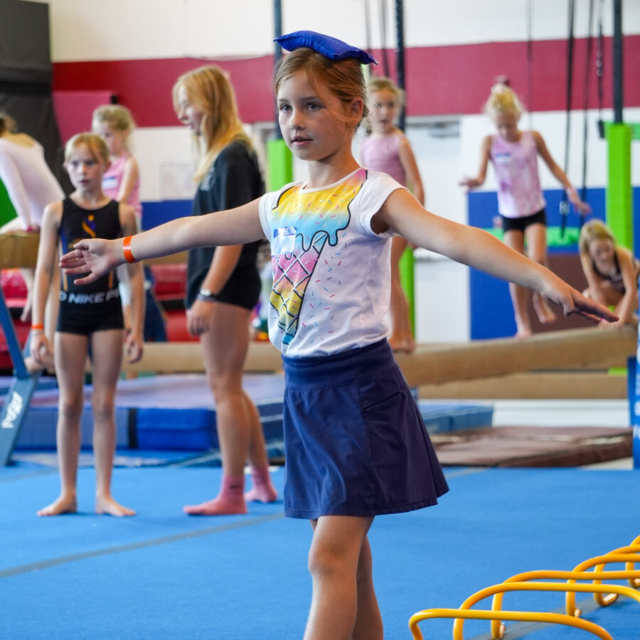 Kids on the bars during a Bailey's Sports camp