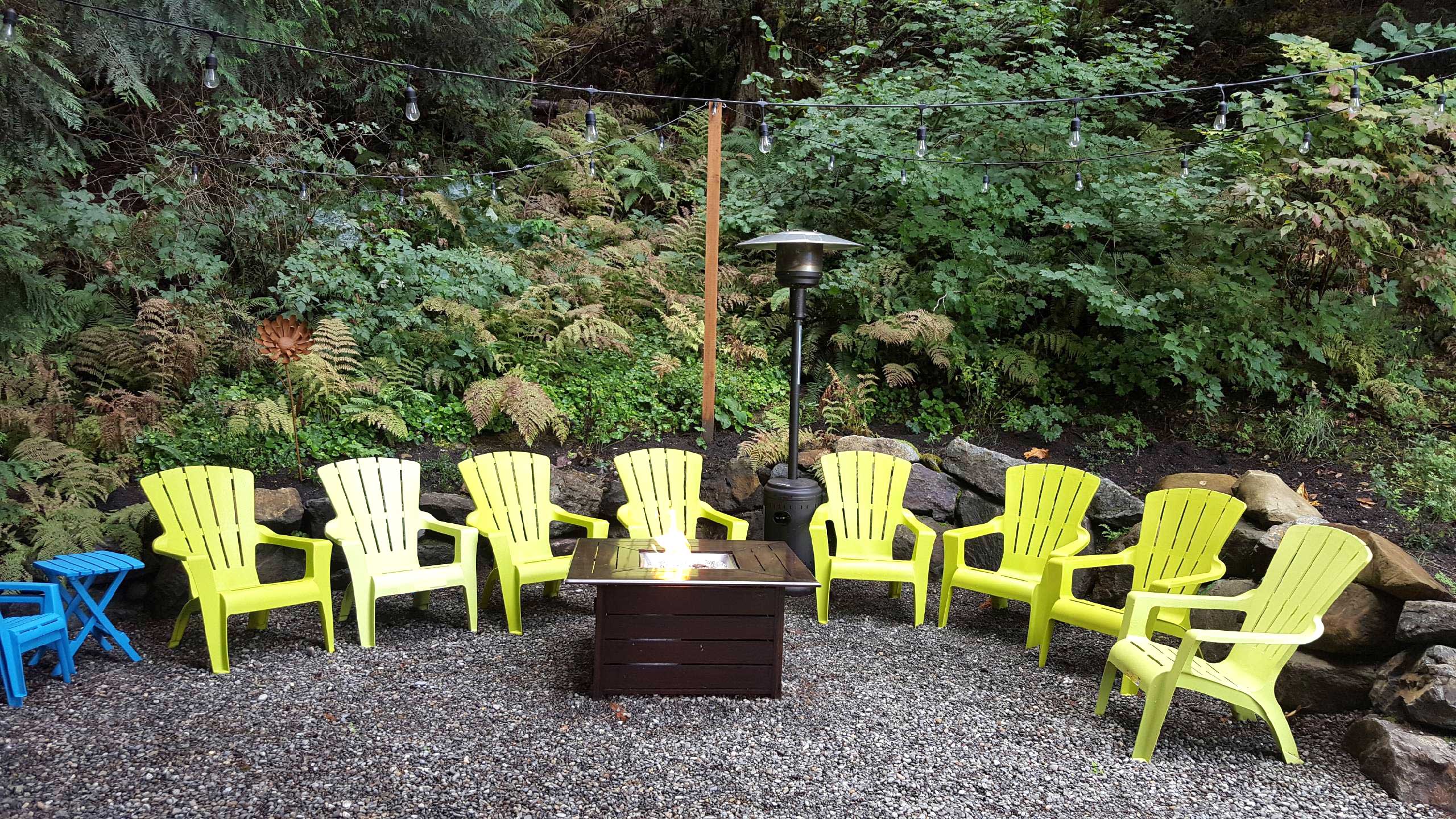 Finished retaining wall making this outdoor space usable and enjoyed by friends and family.