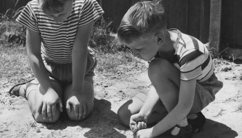 Two Boys Pitching Marbles