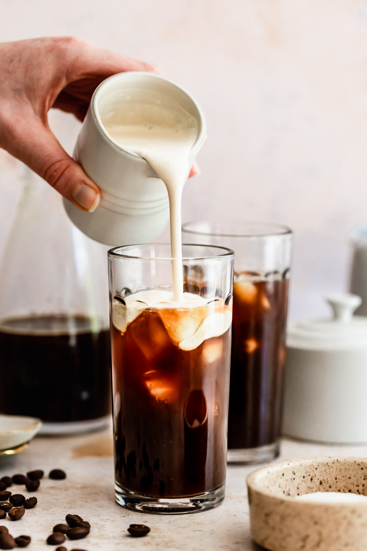 Espresso shots topped with cold water produce a light layer of crema, then served over ice. Iced Americano What It Is Recipe And Easy Variations Baking Ginger