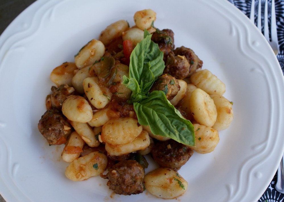 Gnocchi with Italian sausage, tomatoe and herb sauce