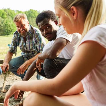 A group of people attending an outdoor workshop