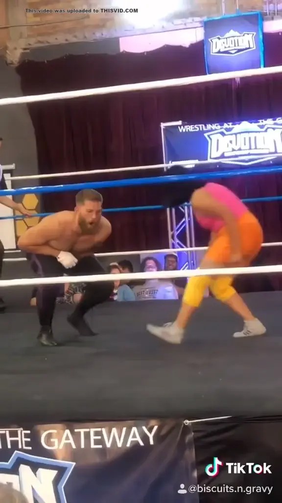 dora busts wrestler in the balls