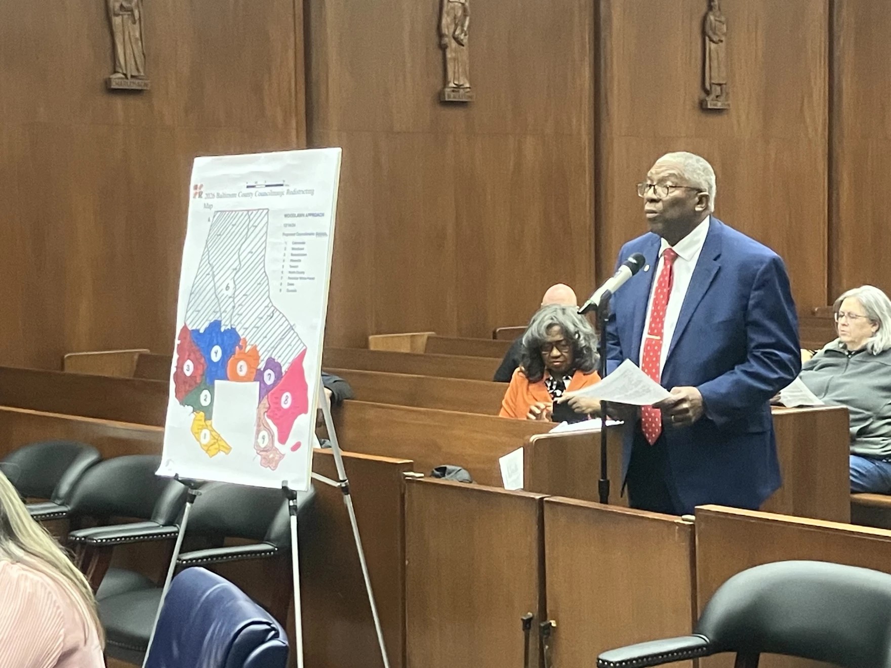Keith Dorsey presents the “Woodlawn Approach” map to the Baltimore County Redistricting Commission. Photo by John Lee/WYPR.