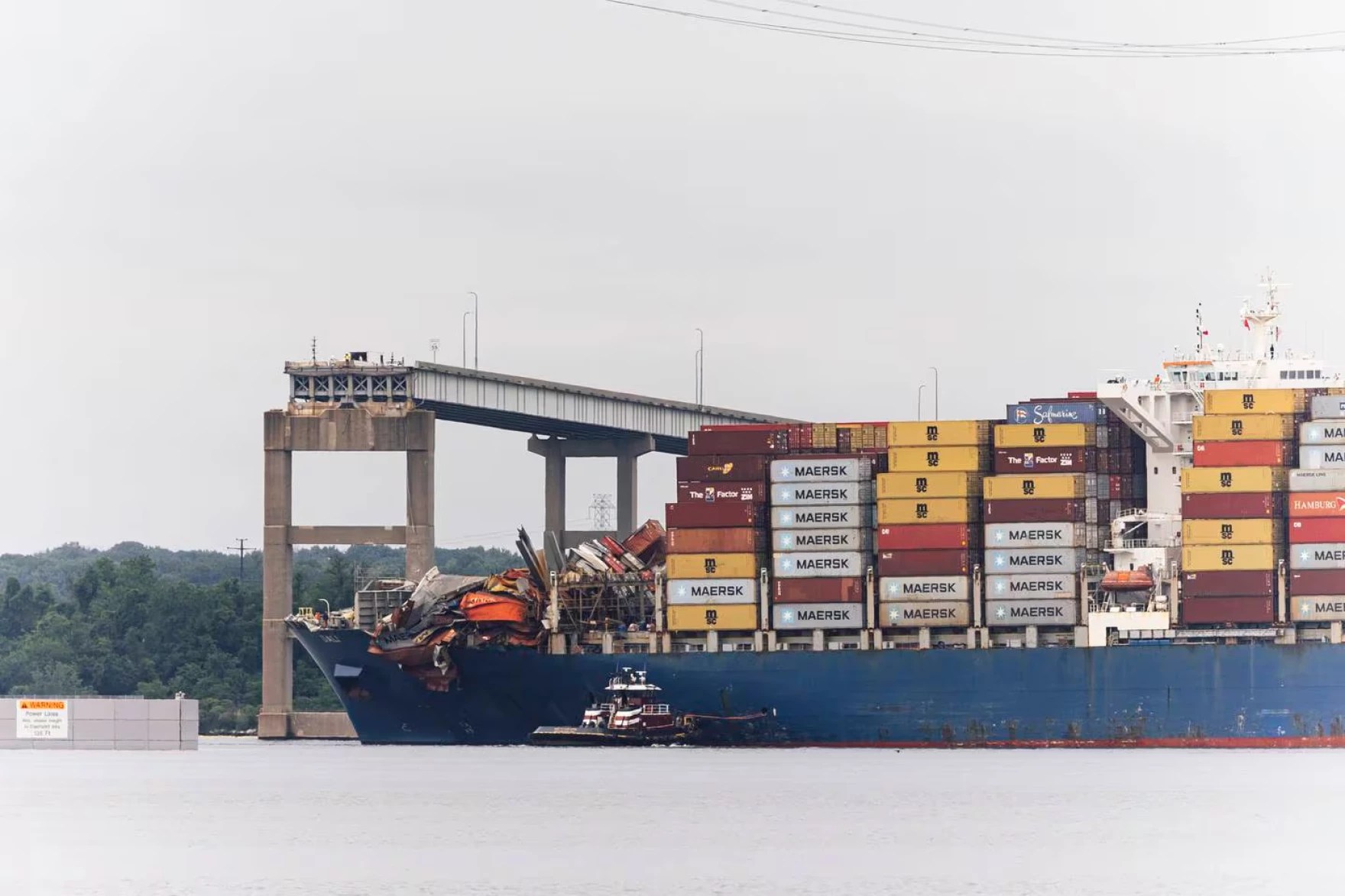 The Dali cargo ship begins to move on Monday morning from the Key Bridge wreckage site. Wesley Lapointe / For The Baltimore Banner