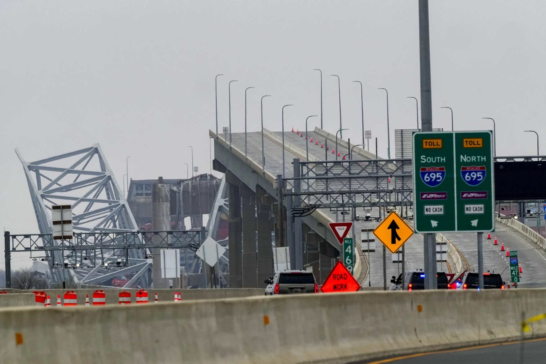 Shown is the wreckage of Francis Scott Key Bridge as seen from Dundalk, Md., on Wednesday, March 27, 2024, Recovery efforts resumed Wednesday for the construction workers who are presumed dead after the cargo ship hit a pillar of the bridge, causing the structure to collapse. Photo credit: Matt Rourke / AP.