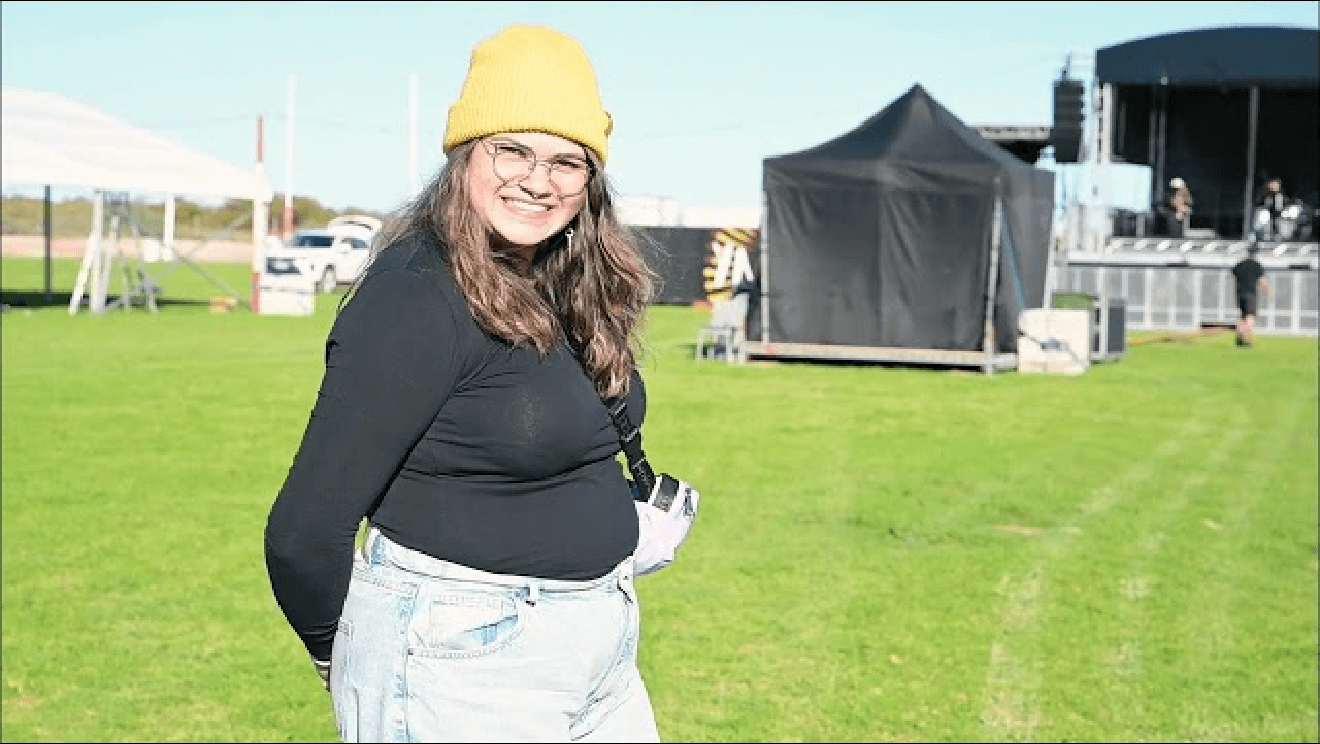 a woman smiling towards the camera