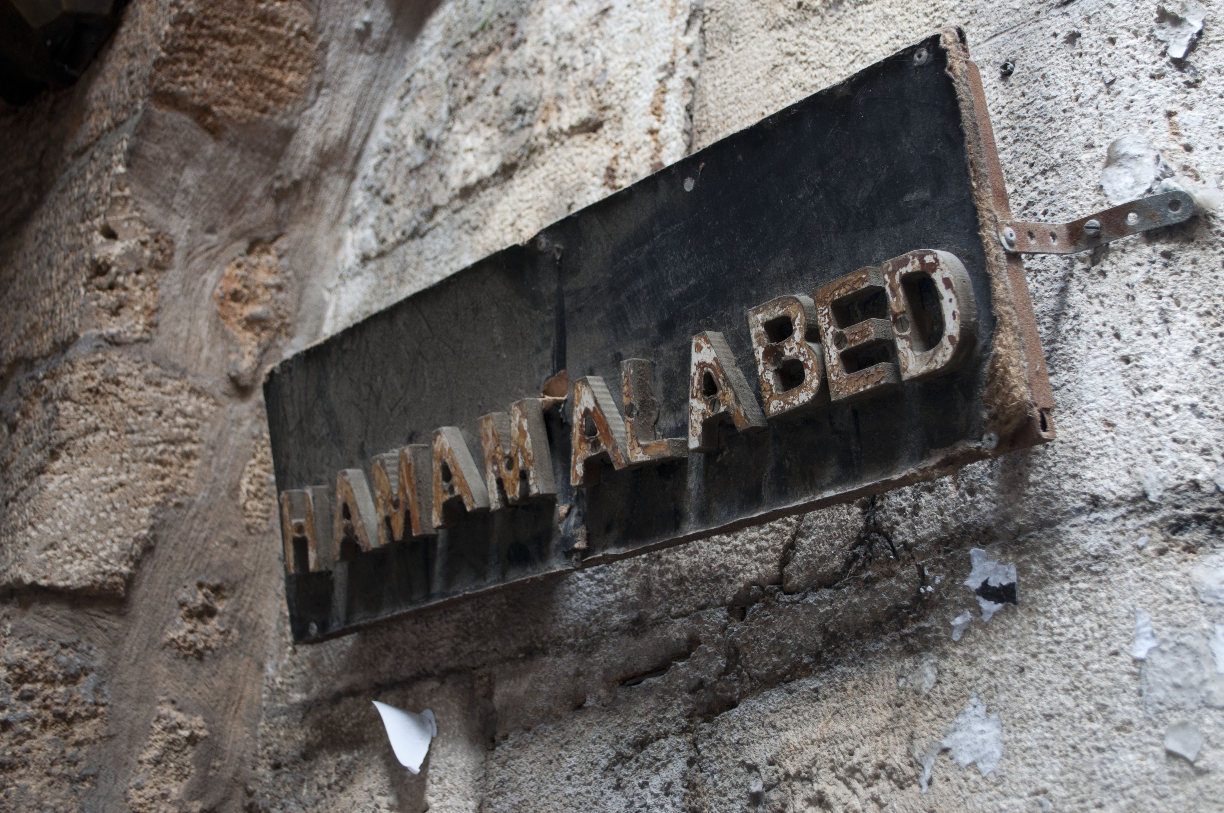 Hamam el Abed signage: the only hamam still operational and only for men