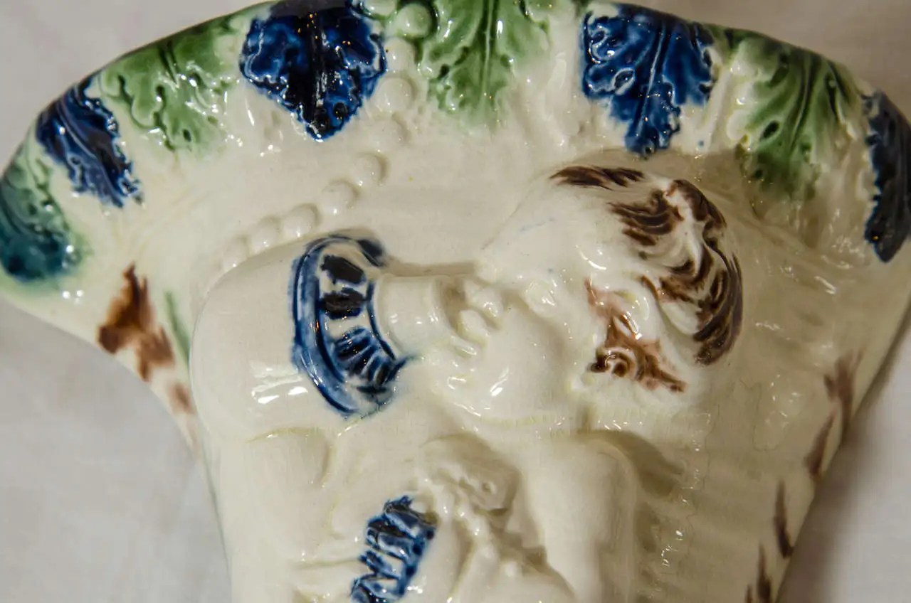 Pair of Antique Creamware Wall Pockets Symbolizing Love