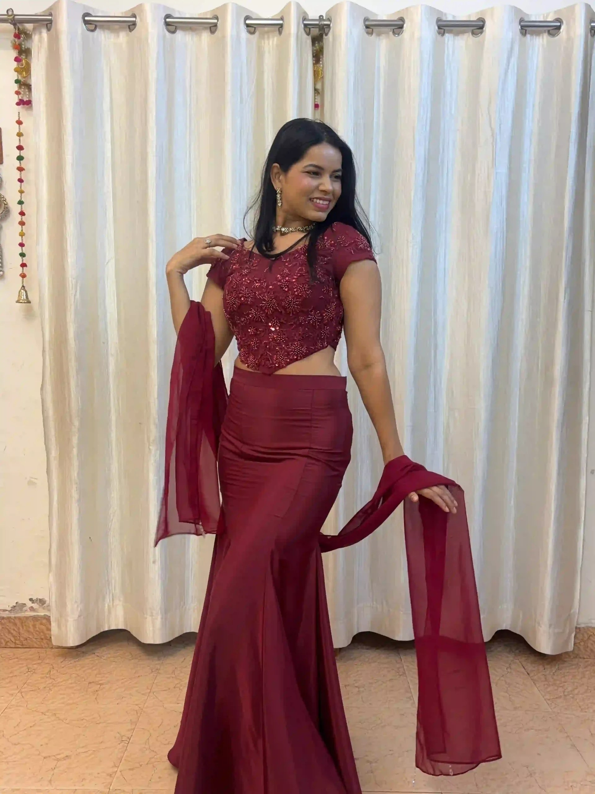 Barhin maroon floral beaded corset dupatta held in motion