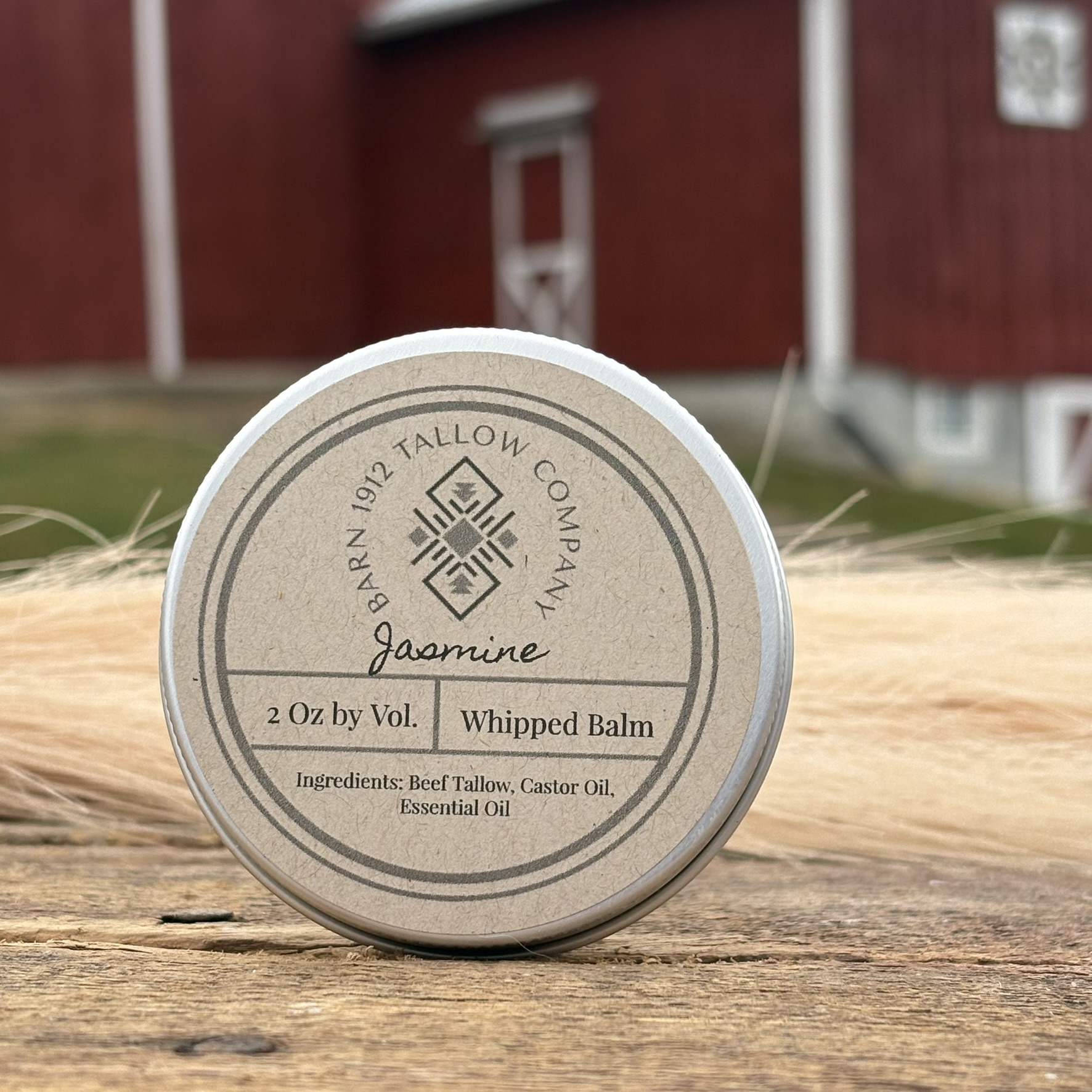 Jar labeled ‘Barn 1912 Tallow Co. Jasmine Whipped Tallow Balm.’ The label lists beef tallow, castor oil, and jasmine essential oil