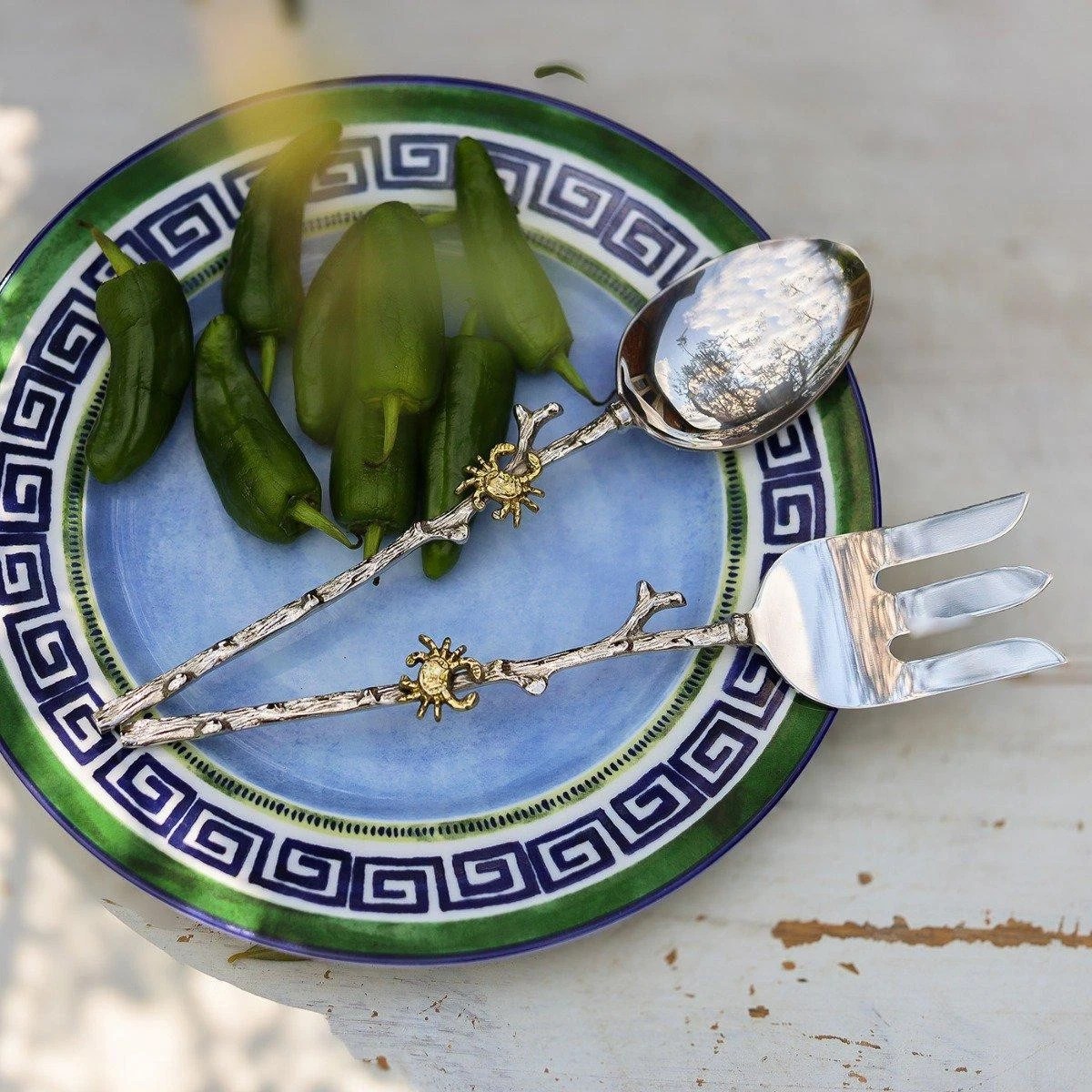 Silver crab salad servers