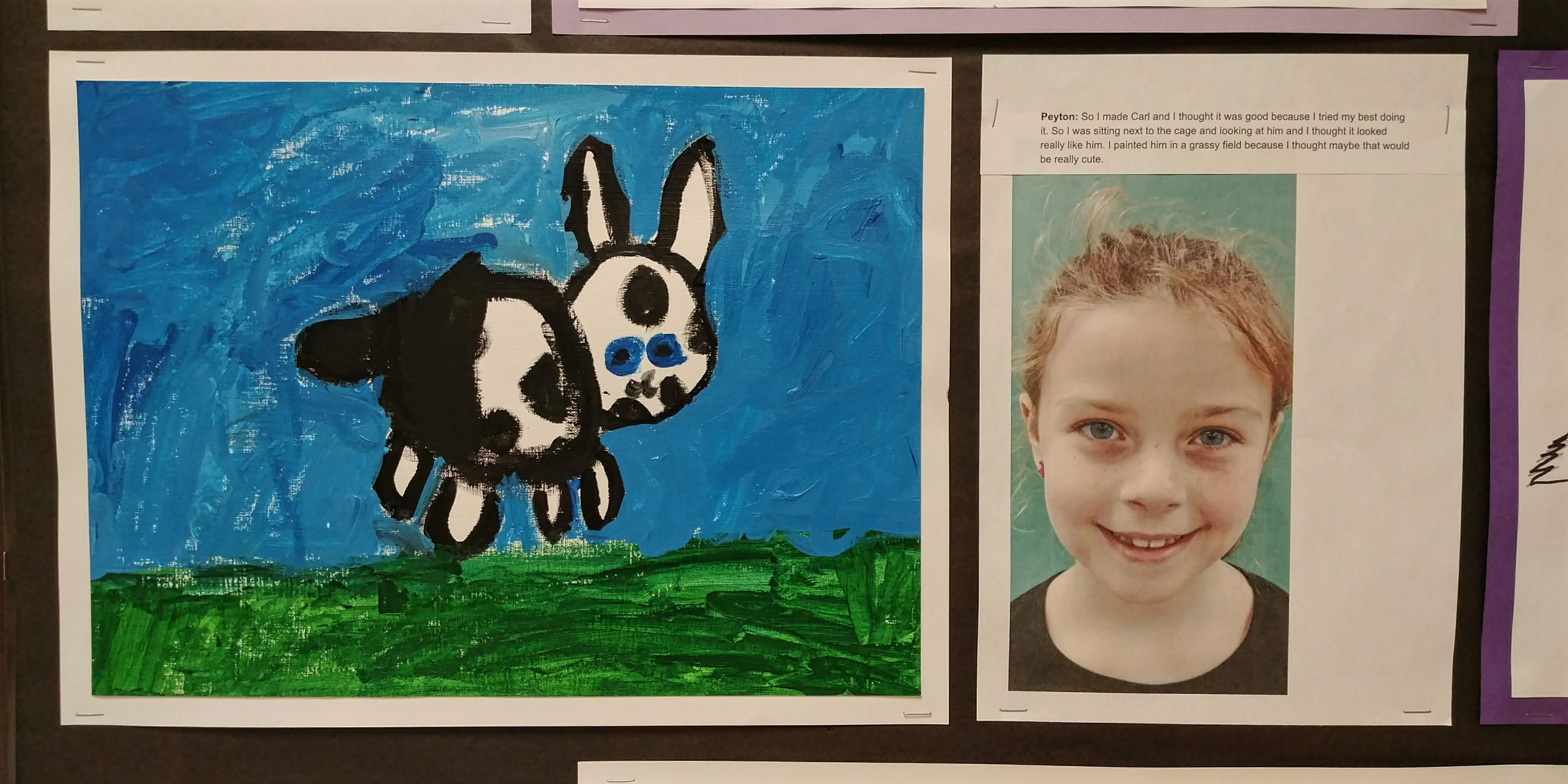 Peyton with her painting of our class pet, Carl.