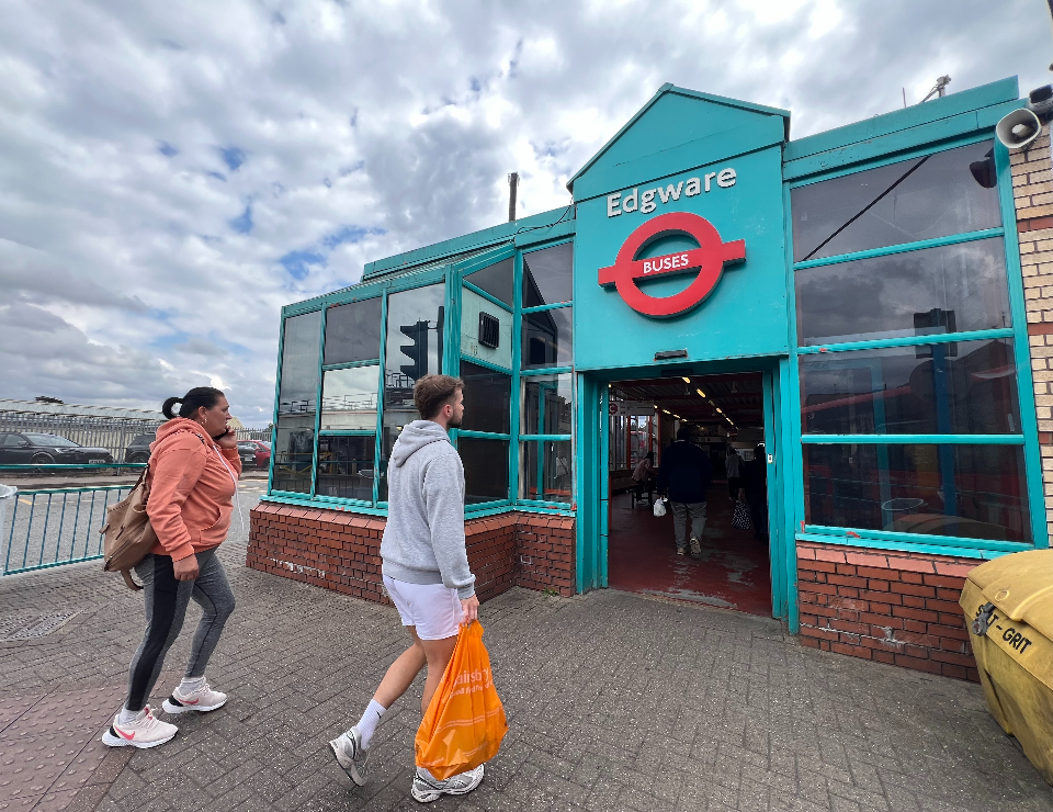People walking into the entrance to Edgware Bus Station