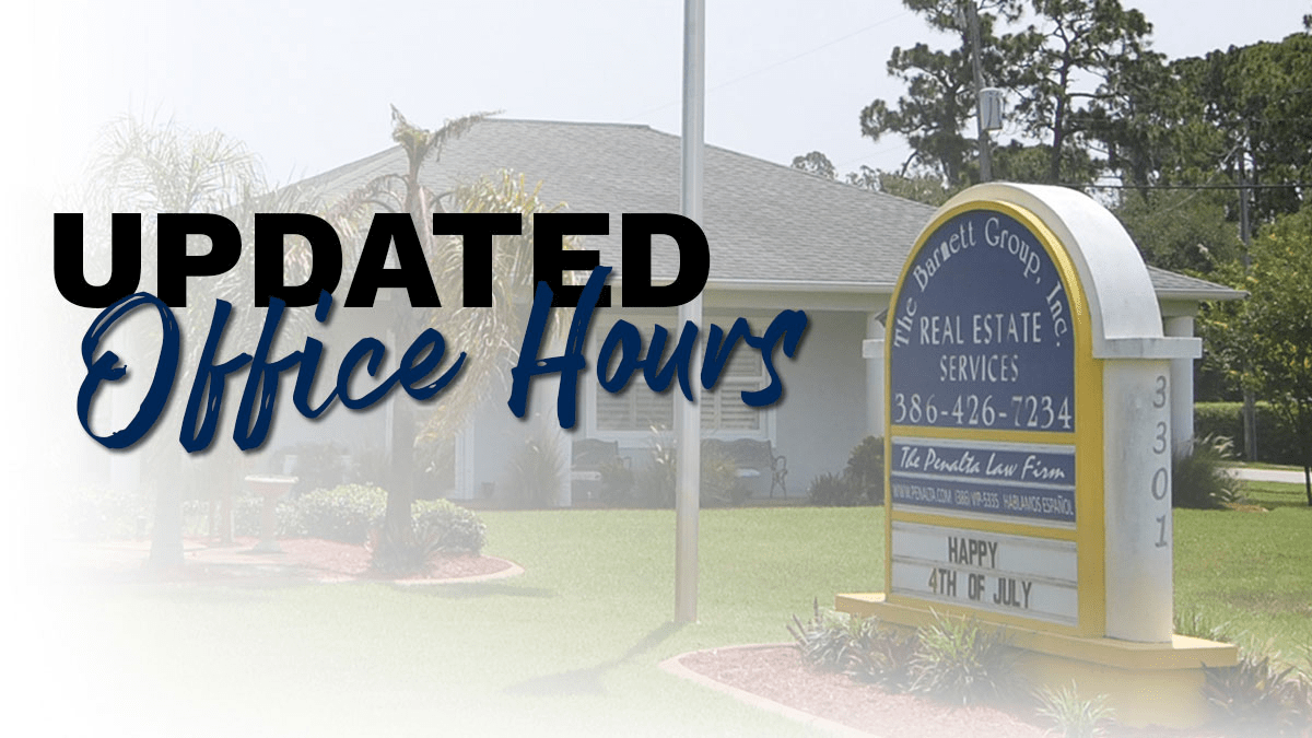 A sunny outdoor photo of the white and yellow monument sign for The Barnett Group, Inc. Real Estate Services. The image has a semi-transparent white overlay on the left with the text "UPDATED Office Hours" written in large, bold dark blue and script font.
