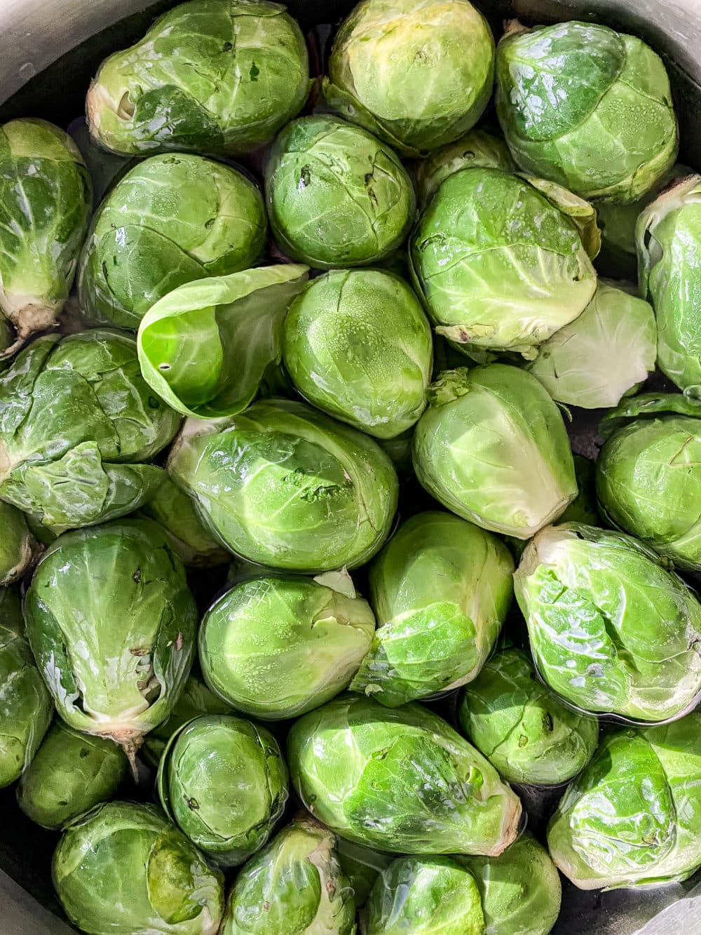 Whole Brussels sprouts in a
pot of water, ready to boil
before smashing