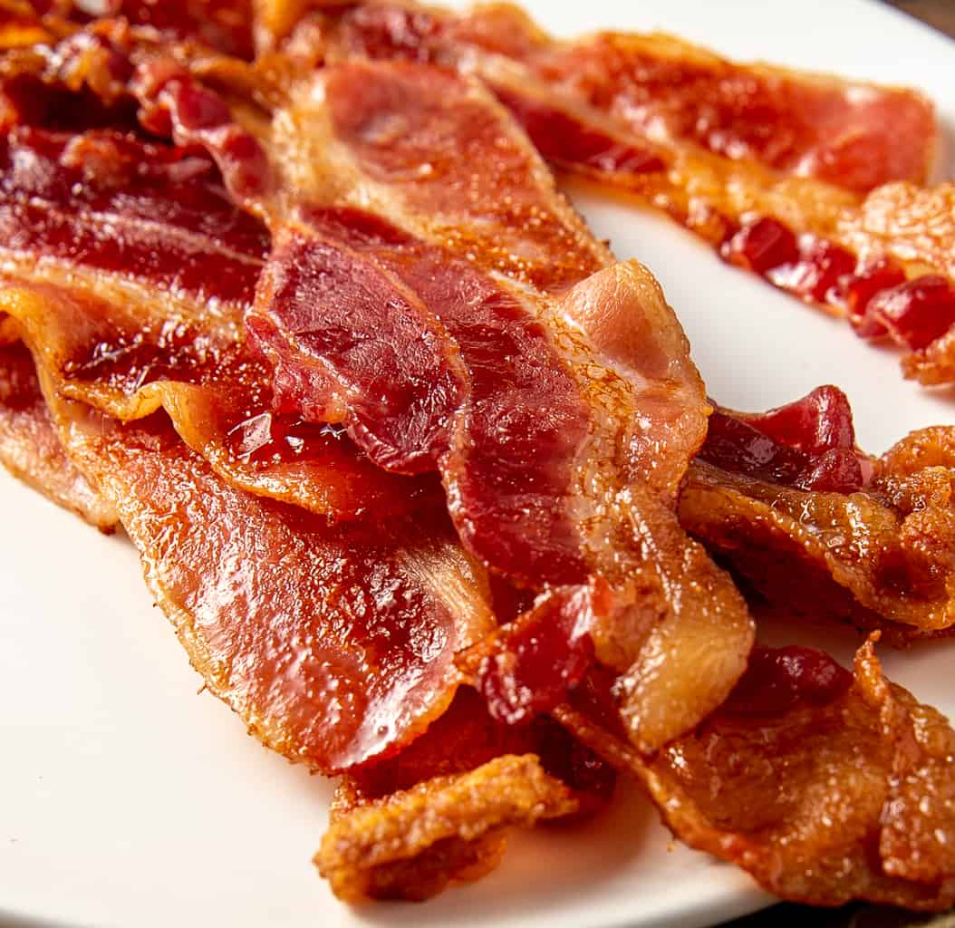 Wipe out the baking pan with a paper towel and put it back where it goes. How To Cook Bacon In The Oven Basil And Bubbly