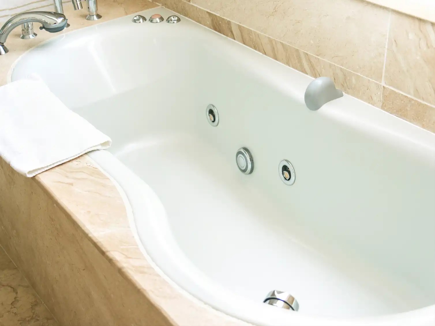 Luxury walk-in tub with jets and ergonomic seating, offering a spa-like experience and enhanced accessibility