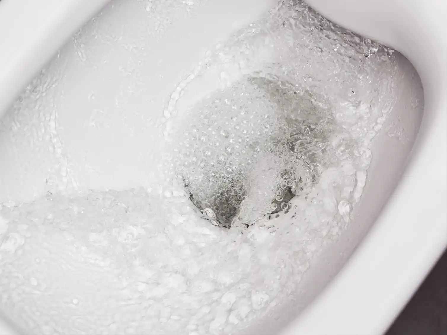 Low-flow toilet for a modern environmentally friendly bathroom upgrade focused on Vanities and Toilets