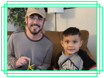 Big and a Little, posing together in the Big Brothers Big Sisters offices.