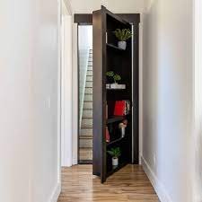 HIDDEN STAIRWAY BEHIND BOOKSHELF