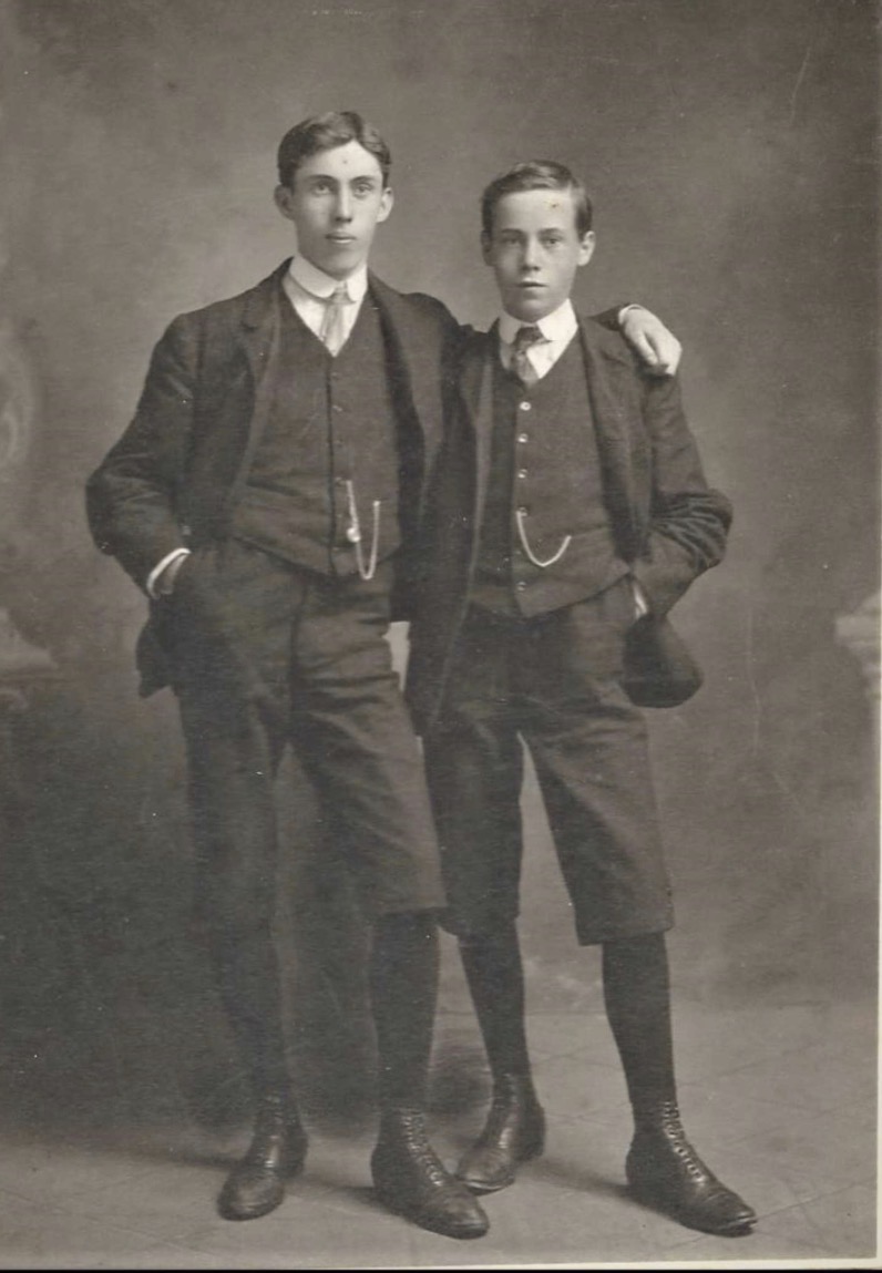 Black and white photograph of two young men