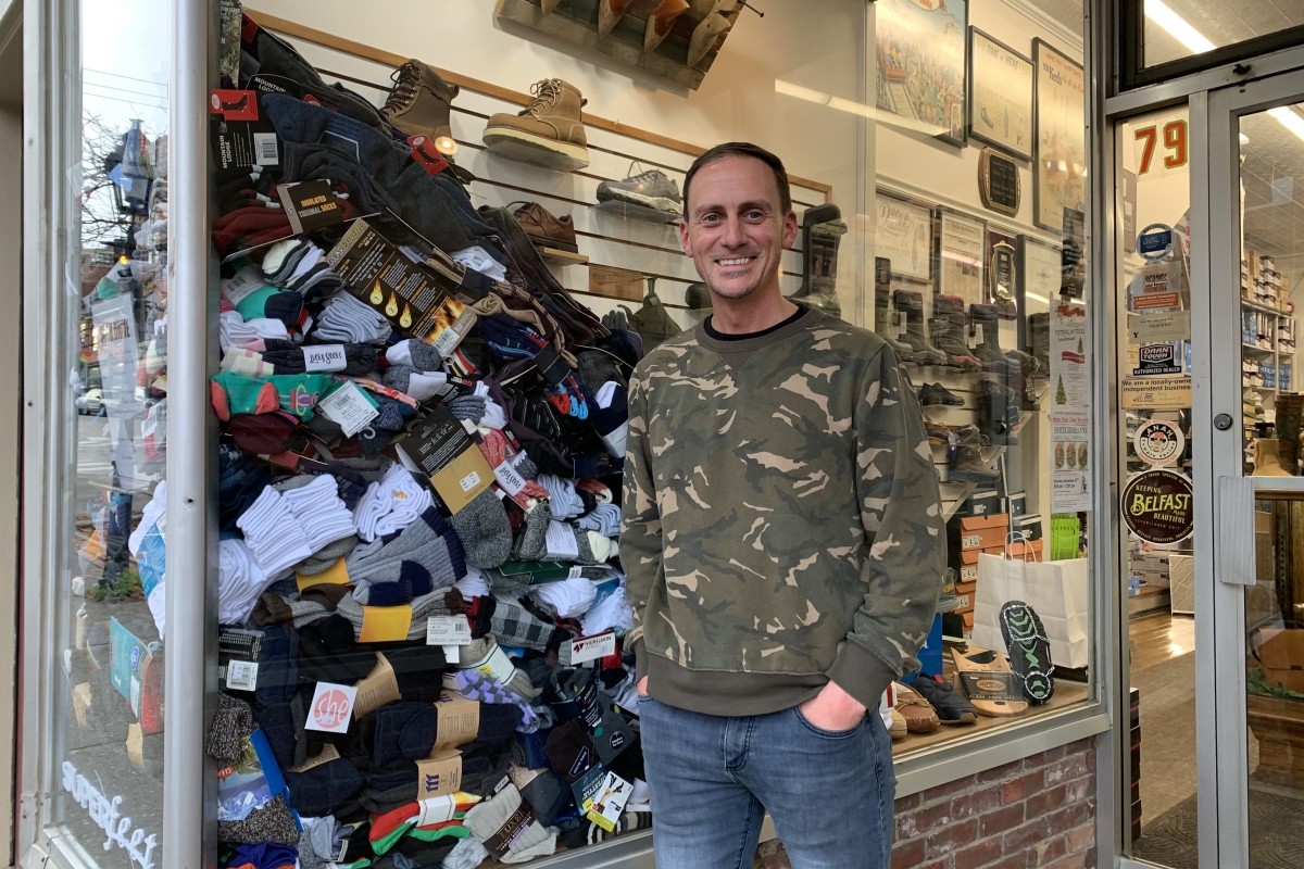 People are bringing thousands of pairs of socks to a Belfast shoe store