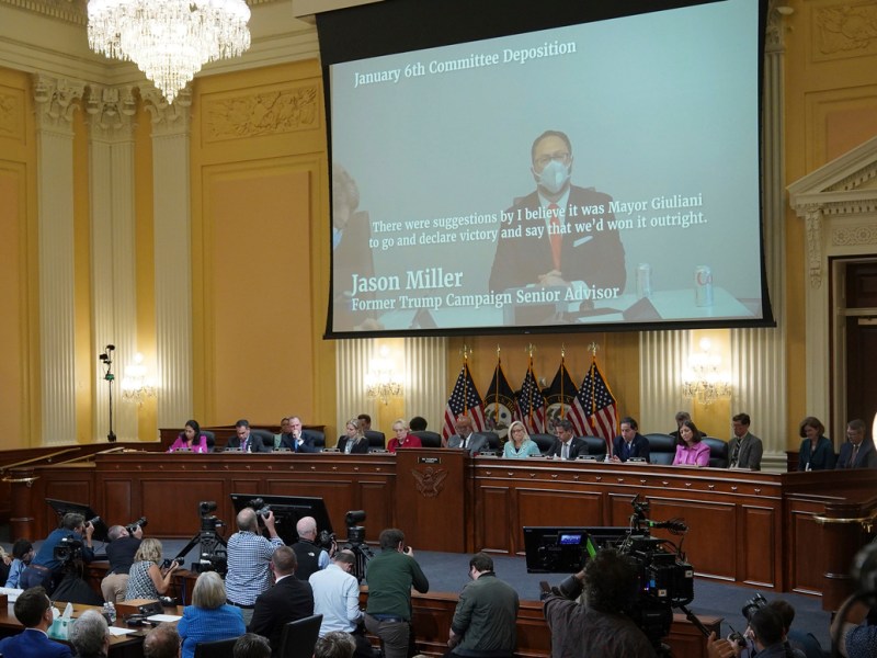 A video of Jason Miller plays during the second day of hearings into the Jan. 6 insurrection.