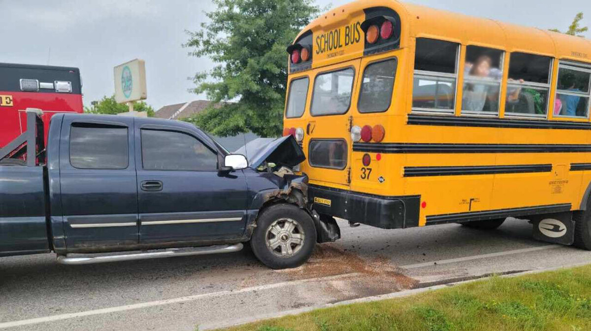 No one was hurt when a truck rear-ended a school bus Tuesday morning.
