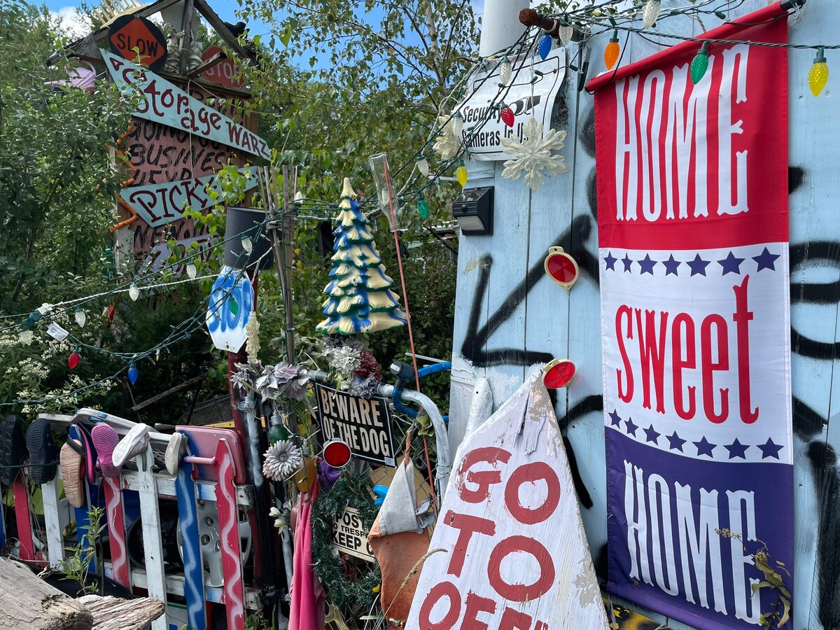 The town of Greene is suing a man who has repeatedly defied its junkyard and flea market ordinances.