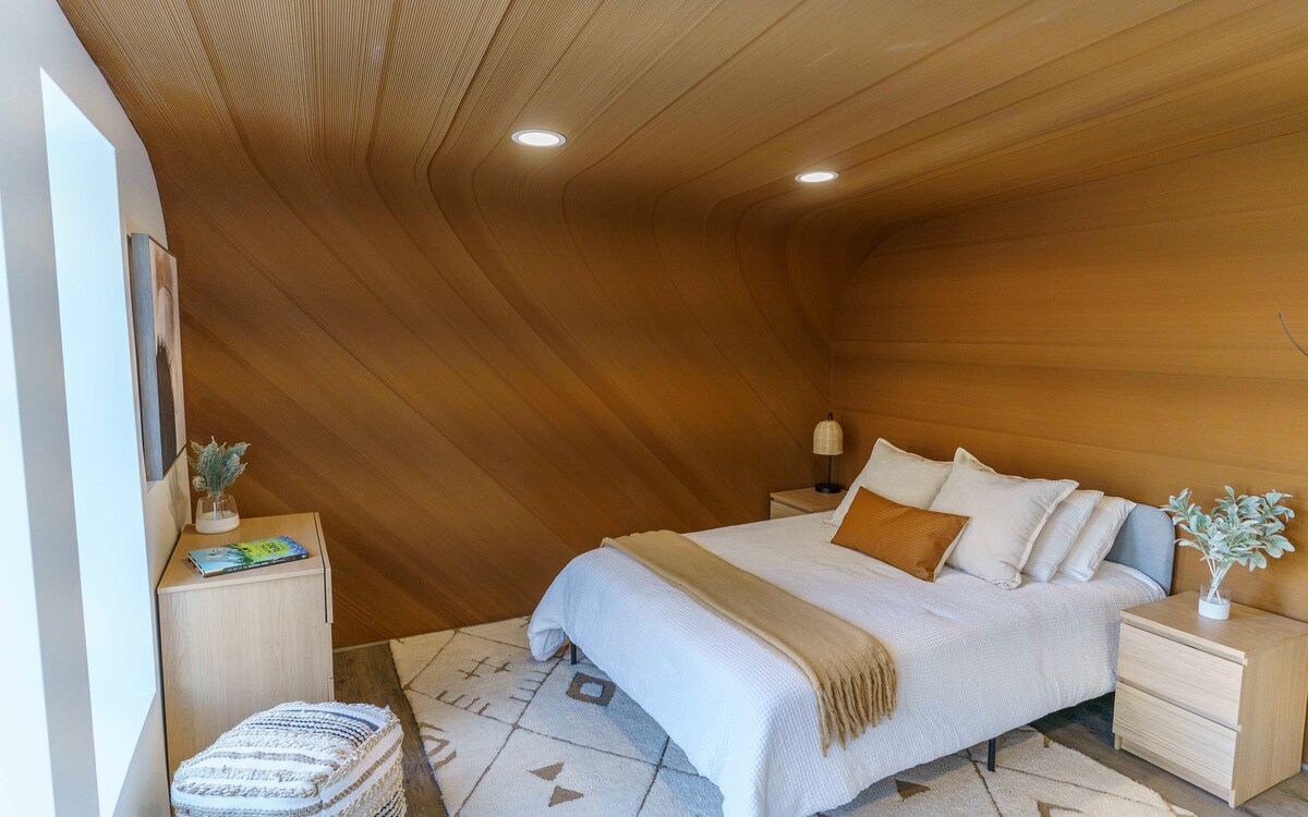 The nine 3D-printed homes will be placed in the Bangor region for people experiencing or at risk of homelessness.