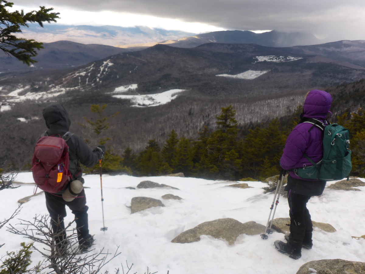 Scenic ledges near the summits of Doublehead Mountain provide panoramic views of the taller surrounding mountains and the valleys below.