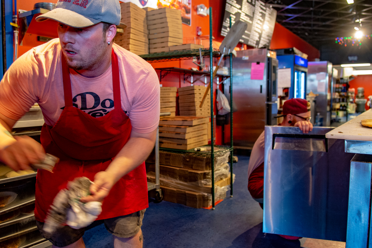 It turns out there's room enough in Ellsworth for the pizza rivals, who banded together to keep the pies rolling.