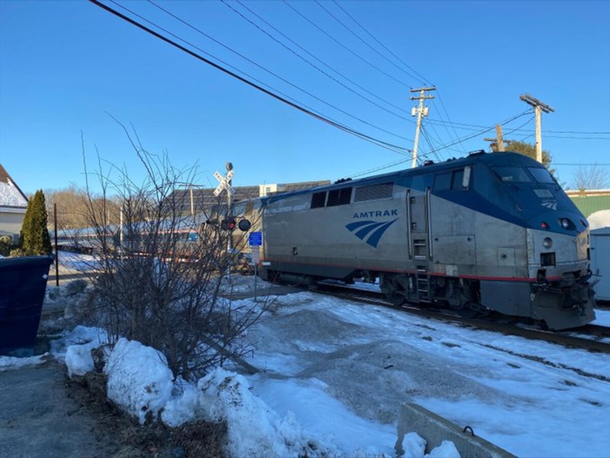 The train was traveling through Biddeford about 6 a.m. when it struck someone on the tracks.