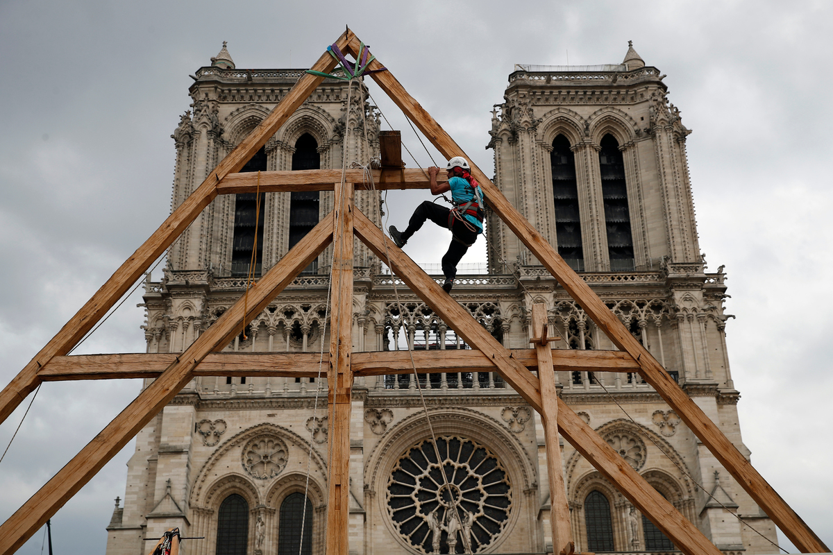 Notre Dame's iconic spire will gradually start reappearing above the monument this year in a powerful signal of its revival.