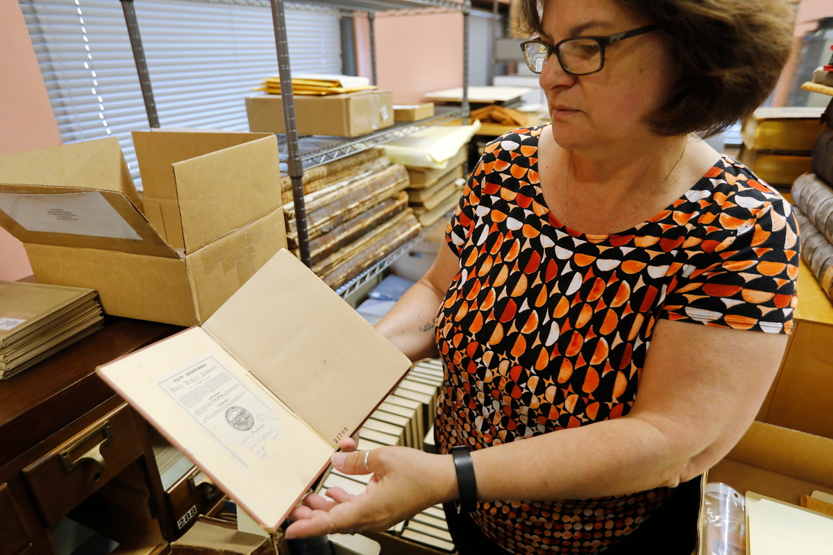 With the New Bedford library's daily 5-cent late fee, someone returning an overdue book after 119 years owe more than $2,100.
