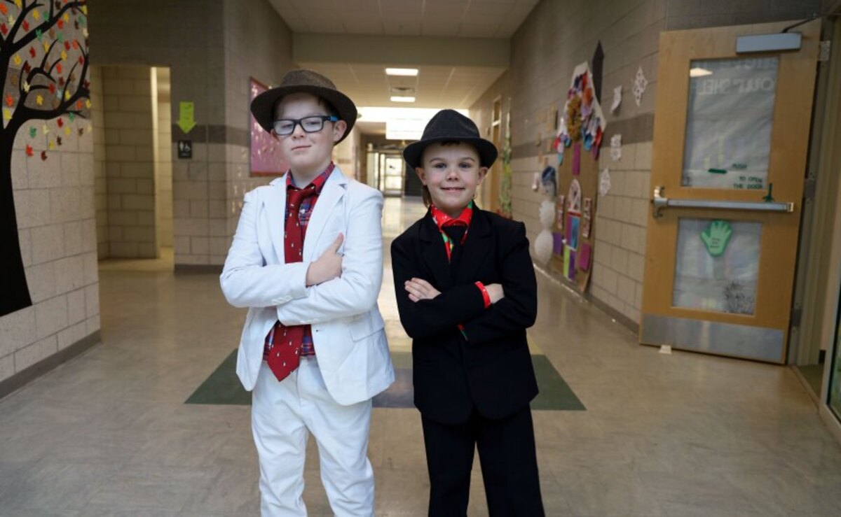 Educators say that students stand a little taller and the mood at school is a little brighter on Dapper Wednesday.