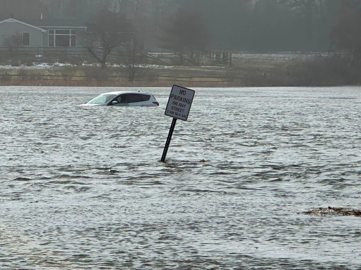 The driver tried to go through standing water on Sawyer Marsh Road, near the Cape Elizabeth-Scarborough town line, when their vehicle was swept away.