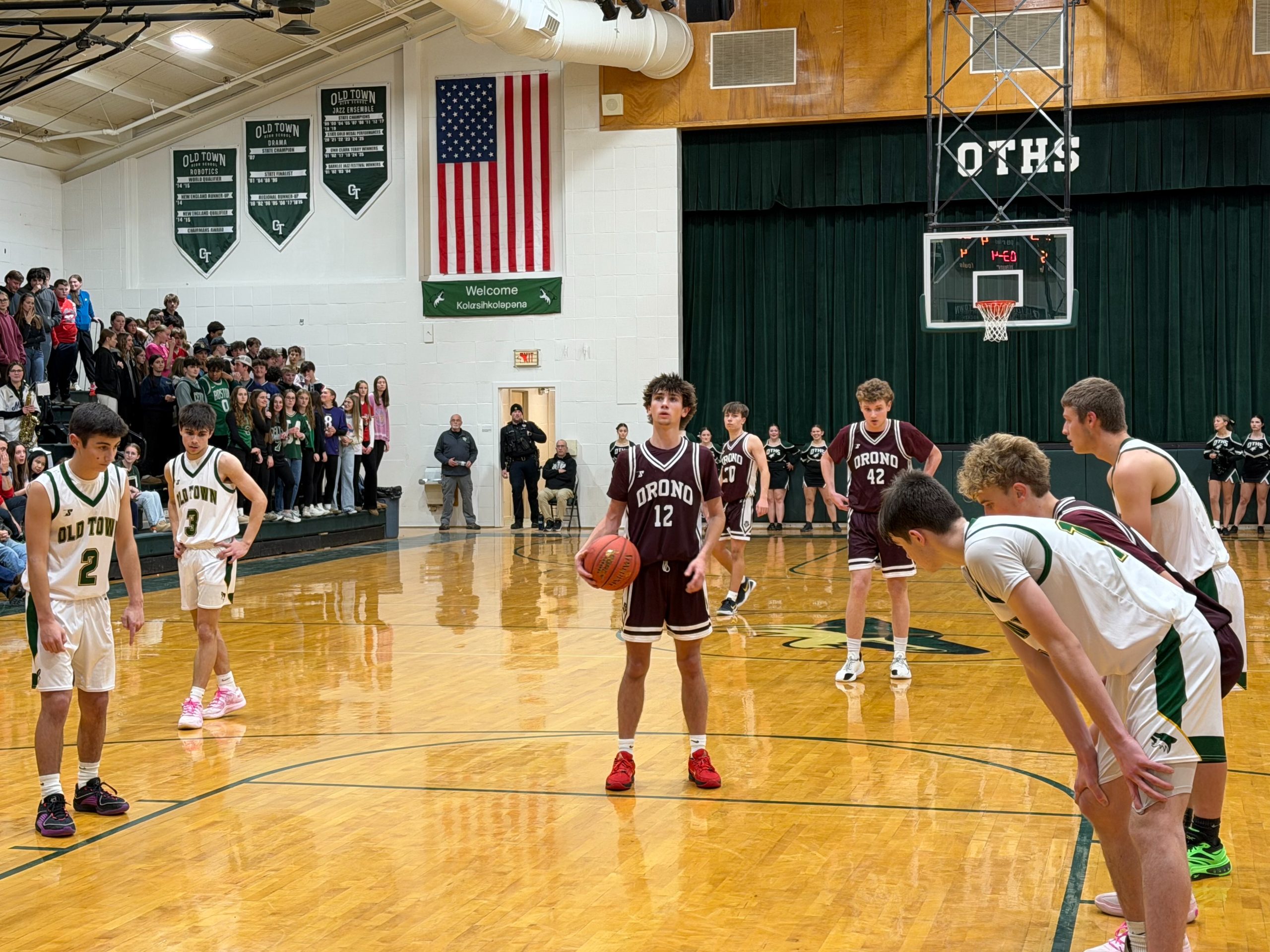 A basketball player at the foul line.