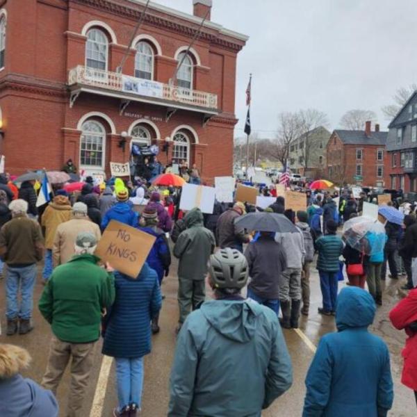 Why I stand on the corner holding a sign