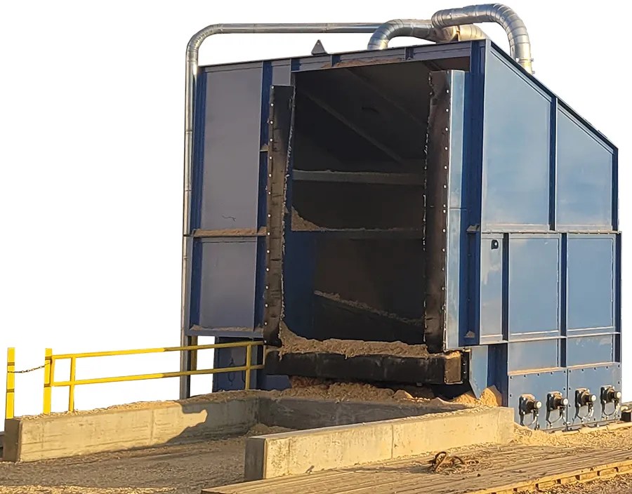 Trailer receiving bin with dust control.