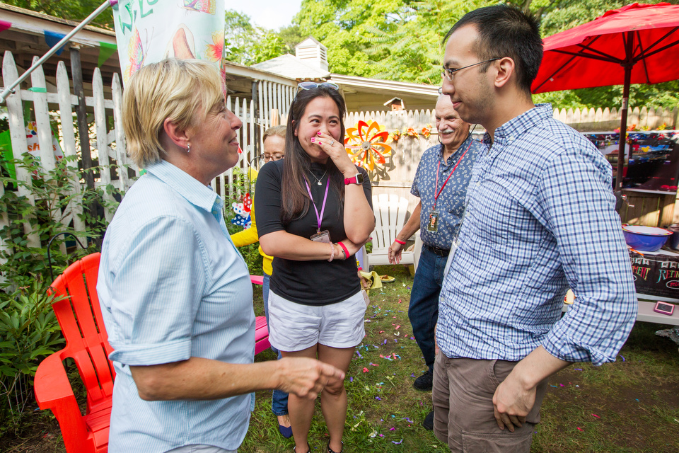Emerald, at center, listens to her former teacher's kind words to her brother.