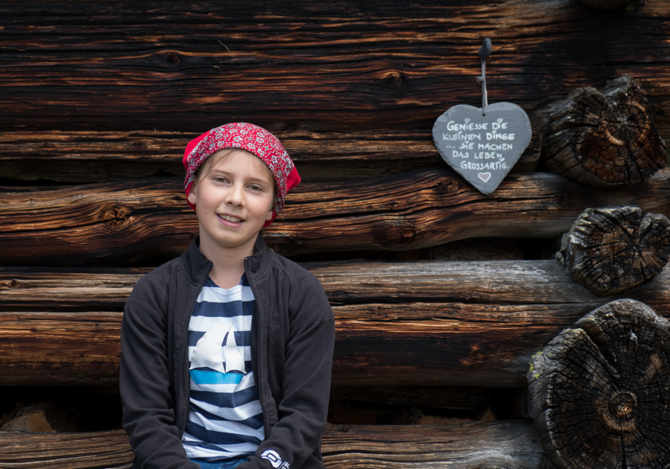 The sign next to Eliza says something like "Enjoy the little things, they are what make life worth it!" Or maybe it says "Get off my property"? but I don't think so. I think it's the first one.