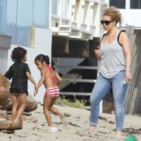 Mariah Carey hits the beach with her twins, Roc and Roe(photos)