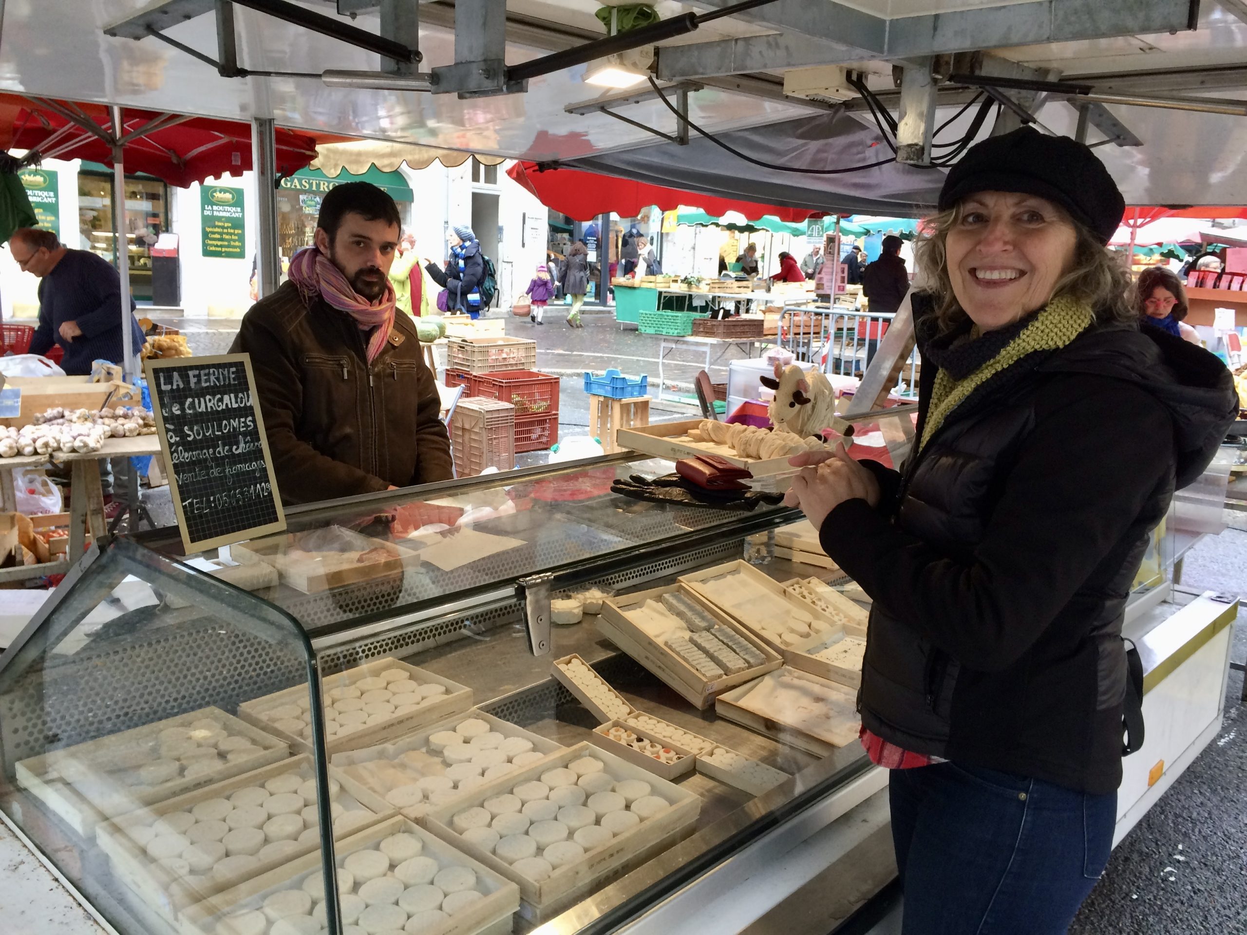 Becky at Cahors weekly market, buying cheese