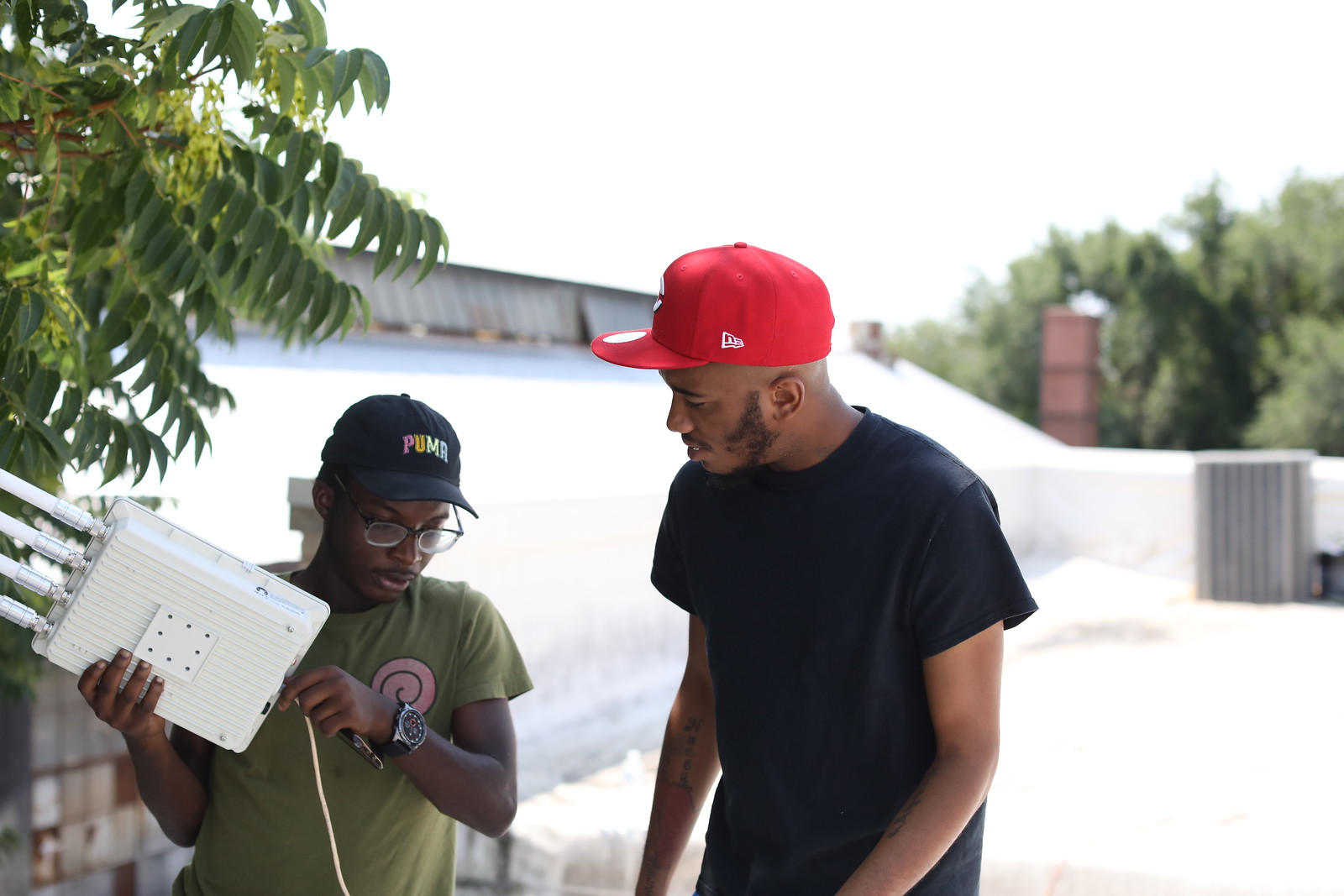 Jonathan Moore's students working on roof