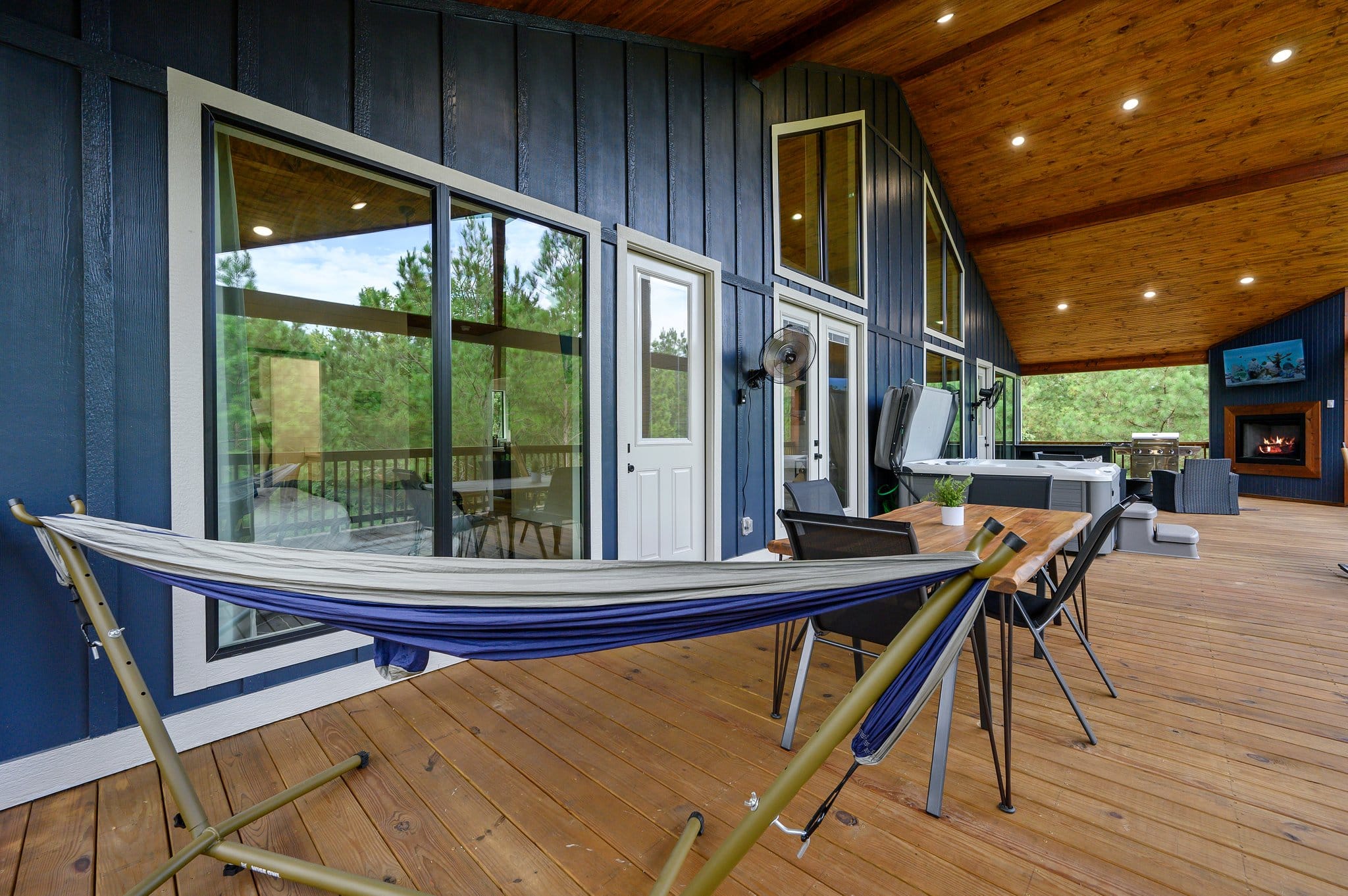Hammock on the covered back deck overlooking the surrounding pine trees