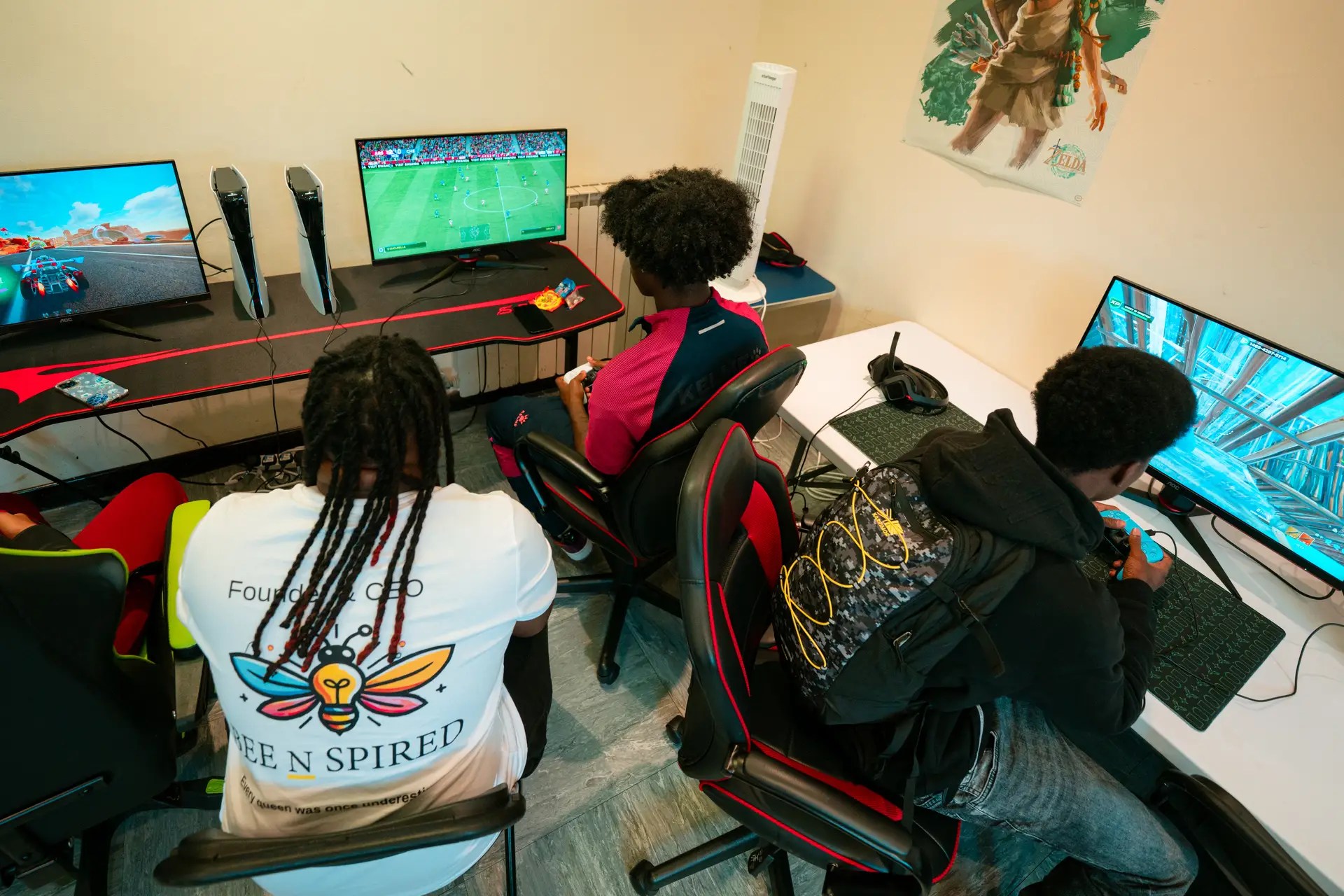 Bee N Spired and Esports Youth Club partnership workshop, showing young people playing video games and learning skills.
