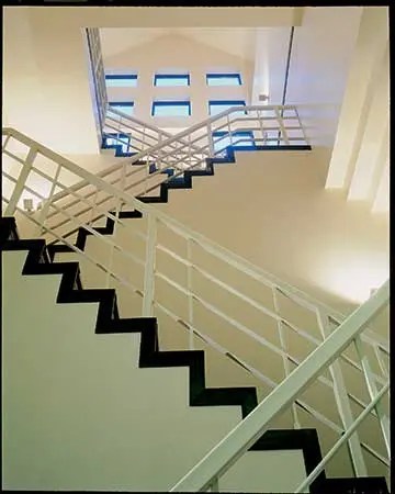 Wall Sconce lighting fixtures in stairwell of office building